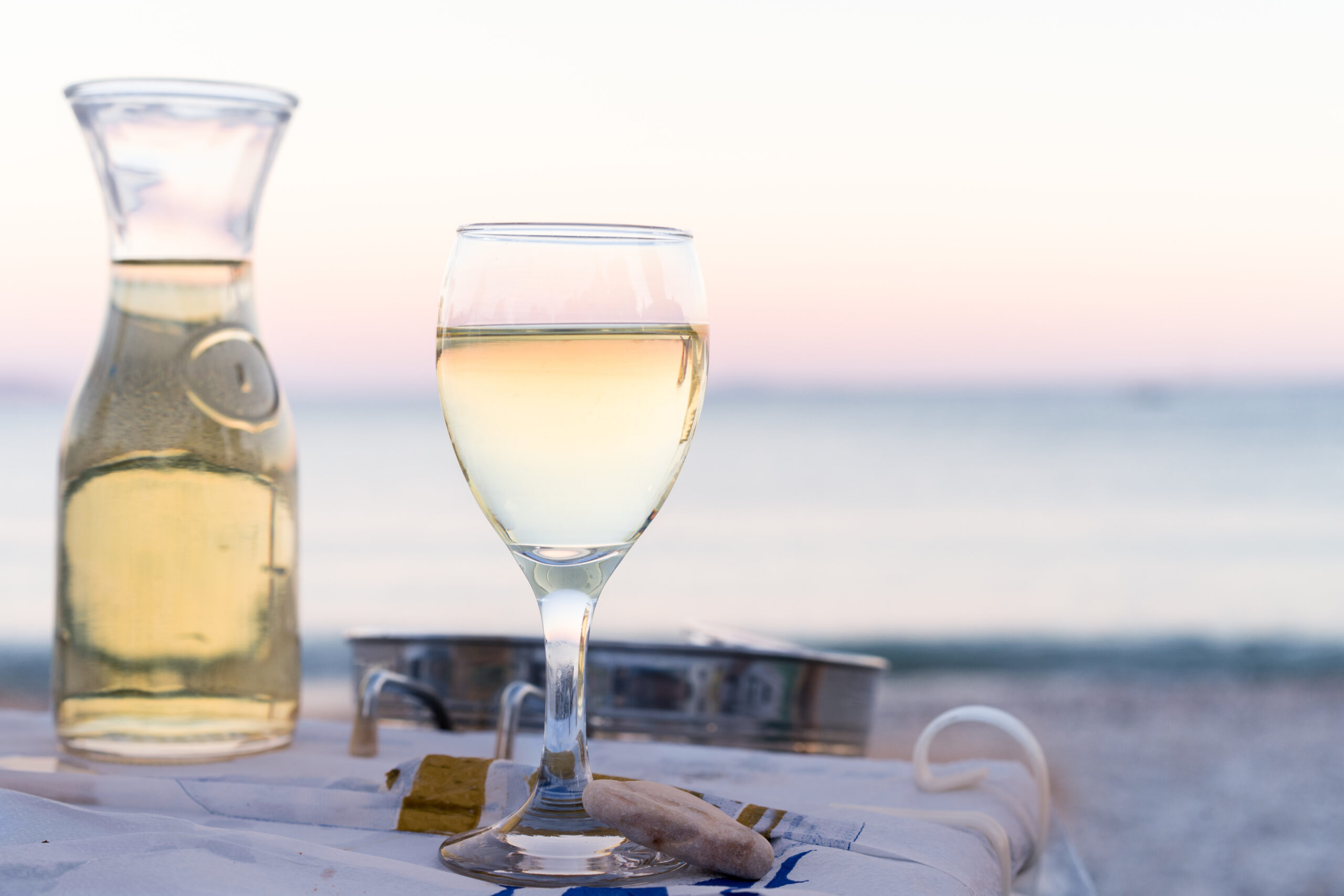 glass and bottle of white wine