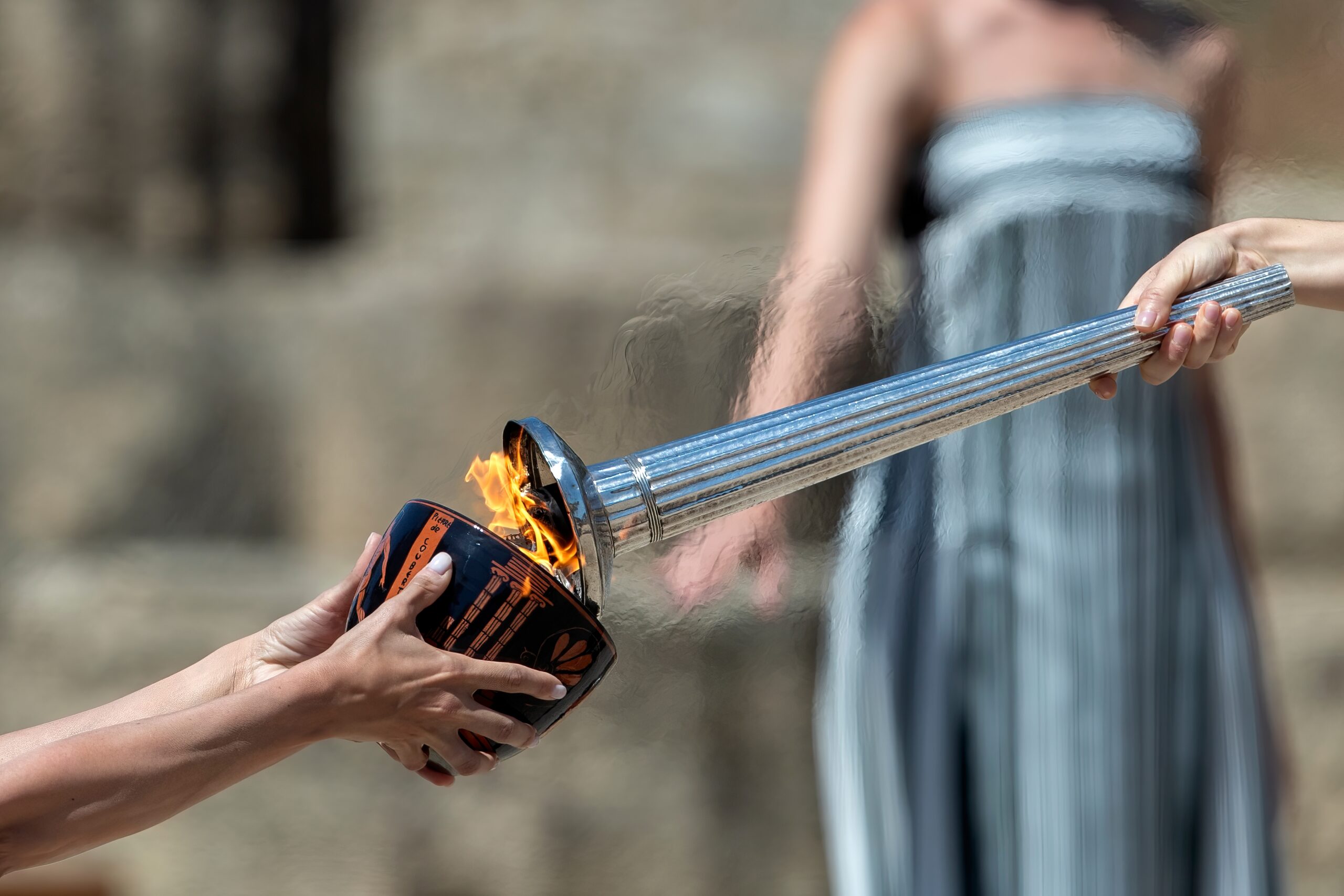 person lighting a torch